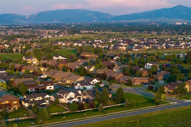 drone / aerial view featuring a mountain view