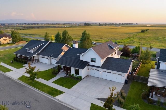 aerial view at dusk with a rural view