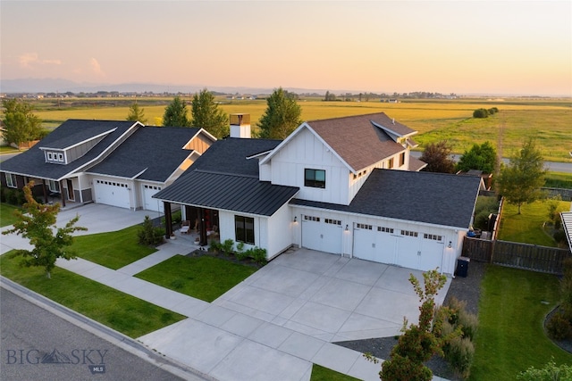 aerial view at dusk with a rural view