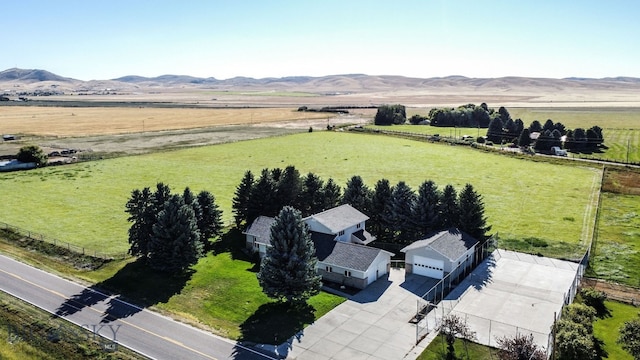 aerial view featuring a rural view and a mountain view