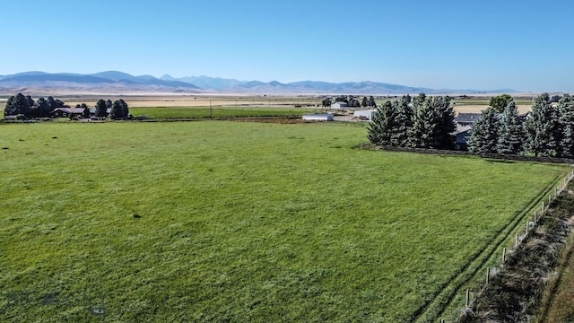 exterior space with a mountain view and a rural view