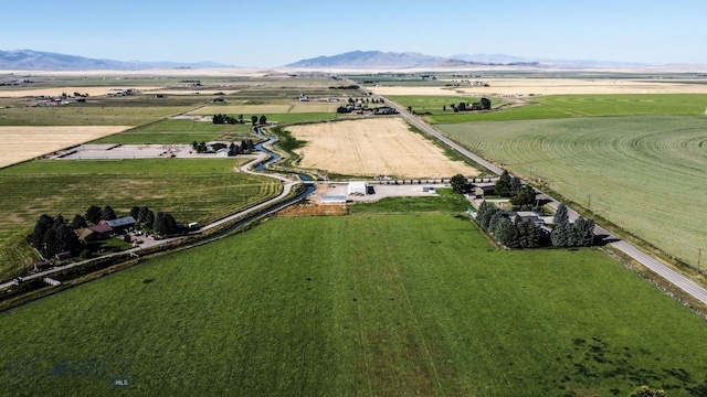 aerial view featuring a mountain view and a rural view