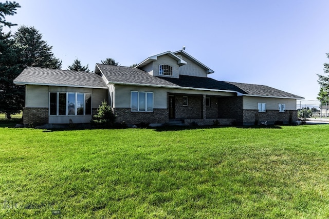 view of front of property with a front lawn