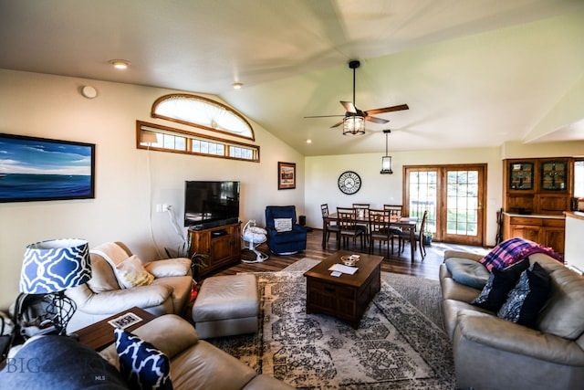 living room with vaulted ceiling, wood-type flooring, and ceiling fan