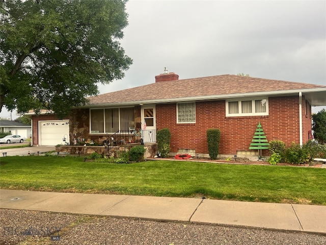 ranch-style home with a garage, covered porch, and a front yard