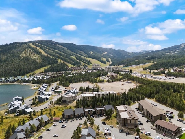 aerial view with a water and mountain view