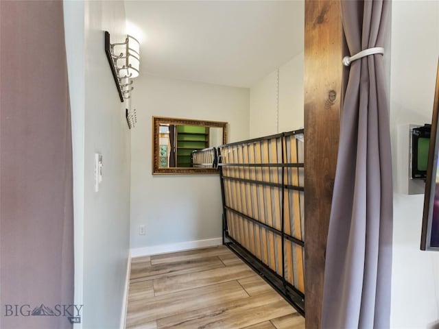 staircase featuring hardwood / wood-style floors