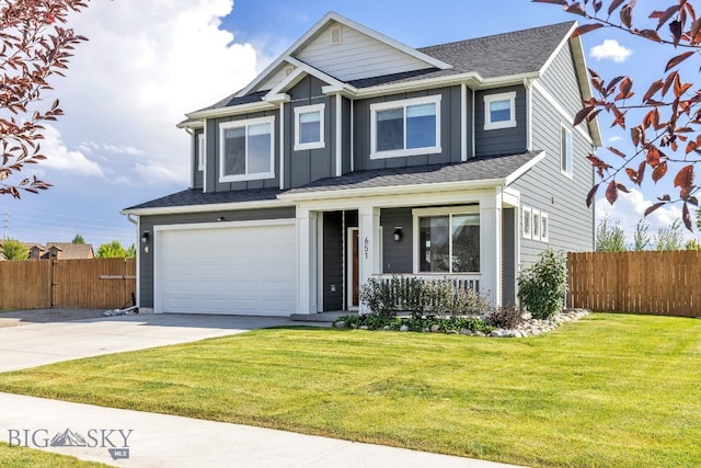 view of front facade featuring a garage and a front yard