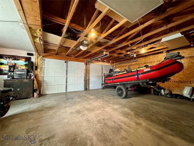 garage featuring a garage door opener