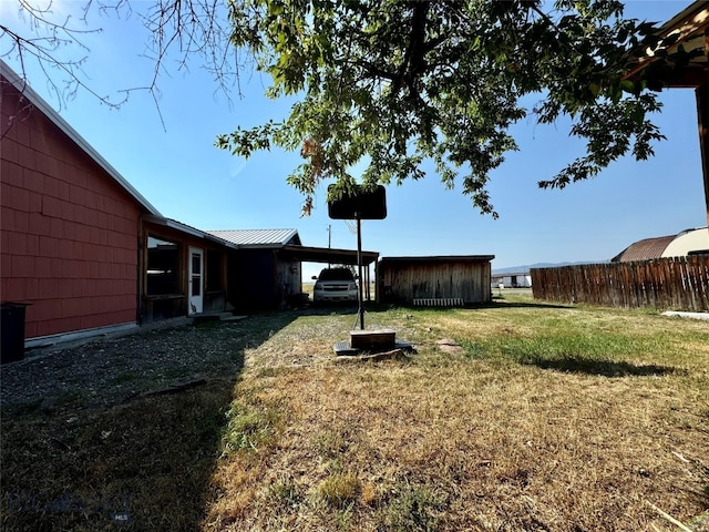 view of yard featuring a carport