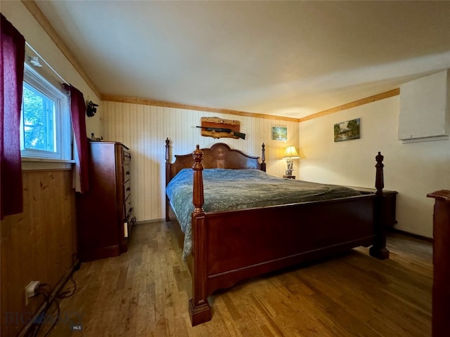 bedroom with wood-type flooring