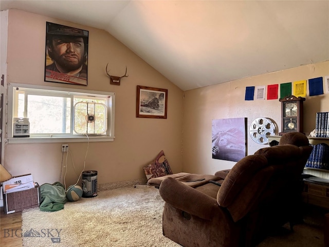 living room featuring vaulted ceiling