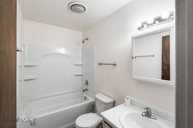 full bathroom featuring shower / bath combination, toilet, and vanity