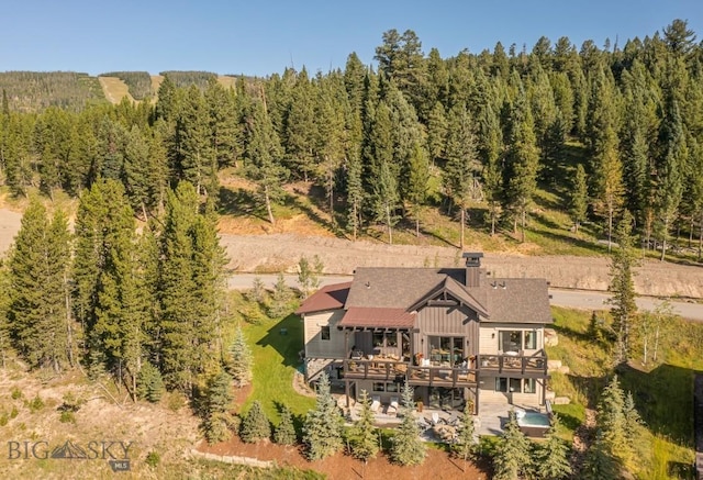 56 Outlook Trl, Big Sky, MT 59716 - bird's eye view featuring a wooded view