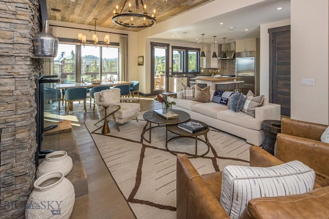 56 Outlook Trl, Big Sky, MT 59716 - living room featuring wood ceiling, recessed lighting, wood finished floors, and a chandelier