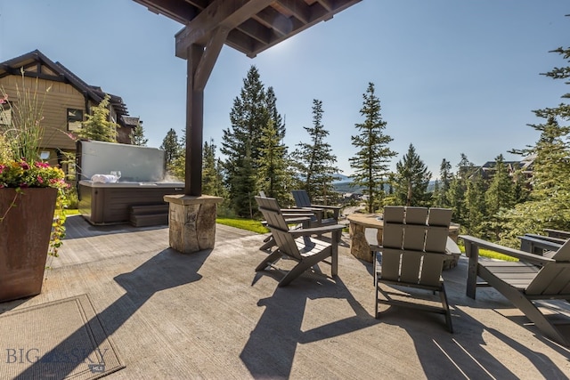 view of patio with a hot tub