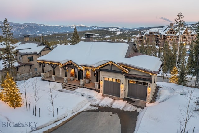 view of front of home featuring a mountain view