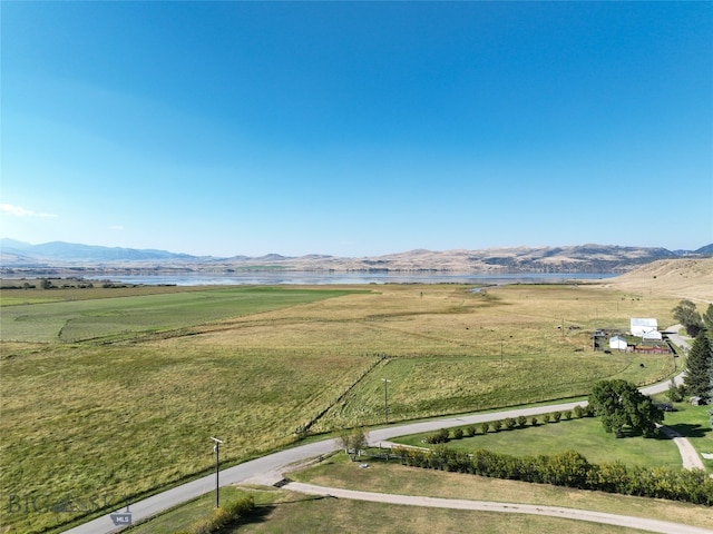 aerial view with a mountain view and a rural view