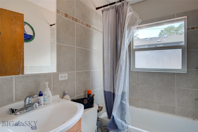 full bathroom with vanity, toilet, shower / bath combination with curtain, and tile walls