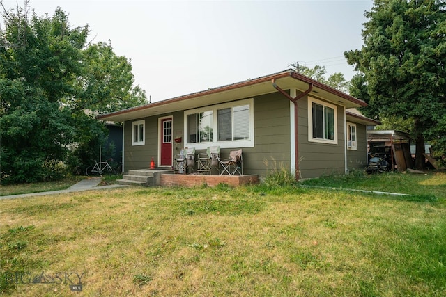 view of front of home with a front yard