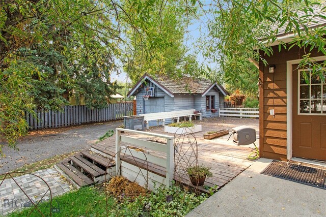 exterior space featuring a wooden deck