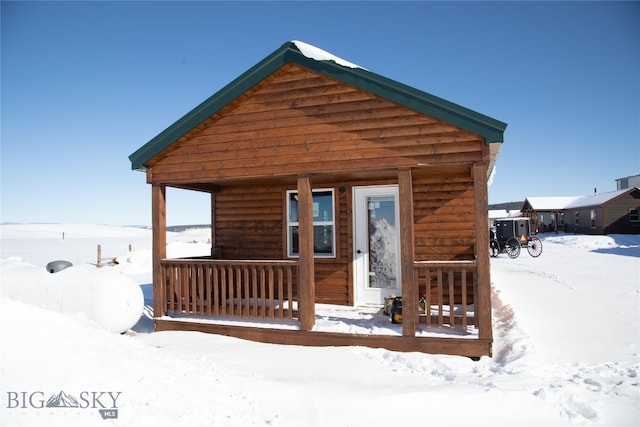 view of log cabin