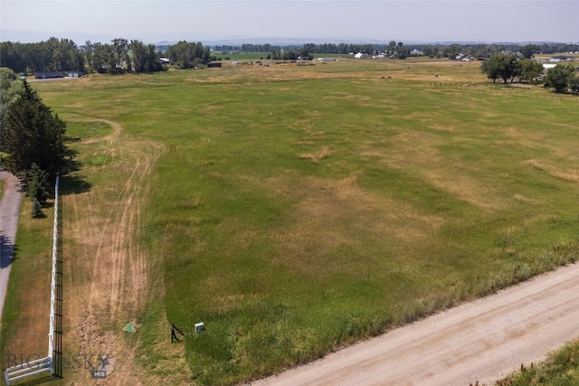 birds eye view of property featuring a rural view