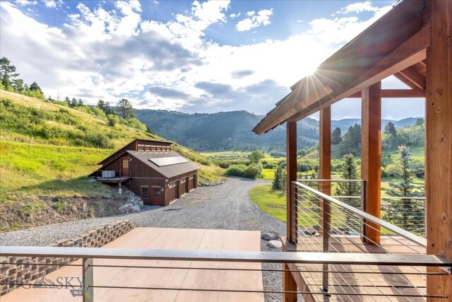 property view of mountains featuring a rural view