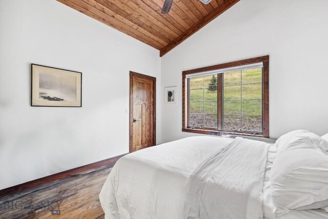 bedroom with dark hardwood / wood-style floors, high vaulted ceiling, ceiling fan, and wooden ceiling