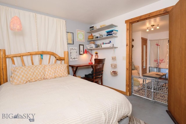 bedroom with concrete flooring