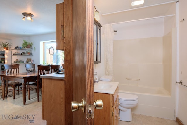 full bathroom featuring vanity, toilet, and shower / bathtub combination