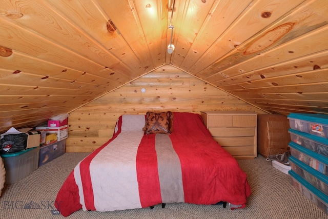 unfurnished bedroom with lofted ceiling, wooden walls, and wooden ceiling