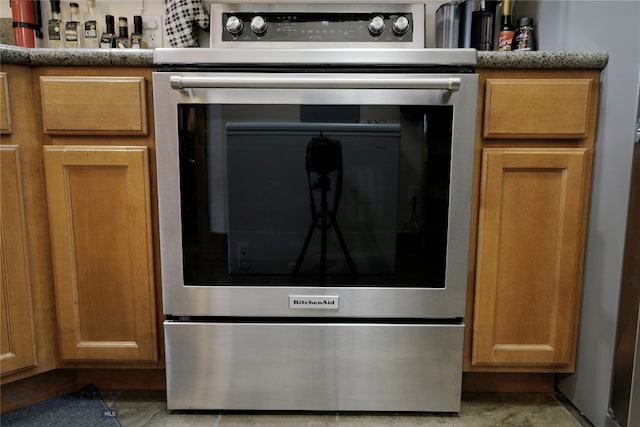 room details featuring stainless steel range oven