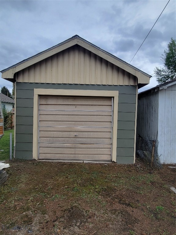 garage with wood walls