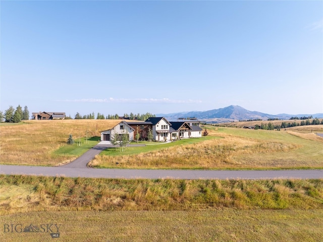 property view of mountains featuring a rural view