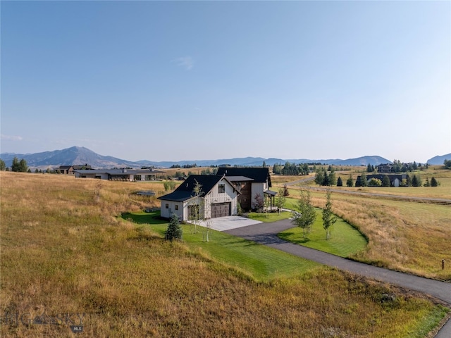 property view of mountains featuring a rural view