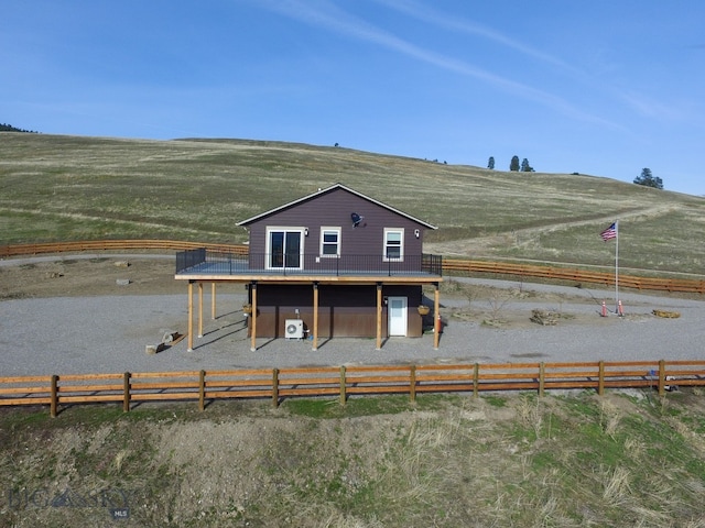 view of front of home featuring a rural view