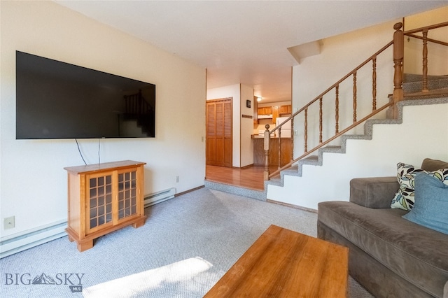 living room featuring a baseboard radiator and light carpet