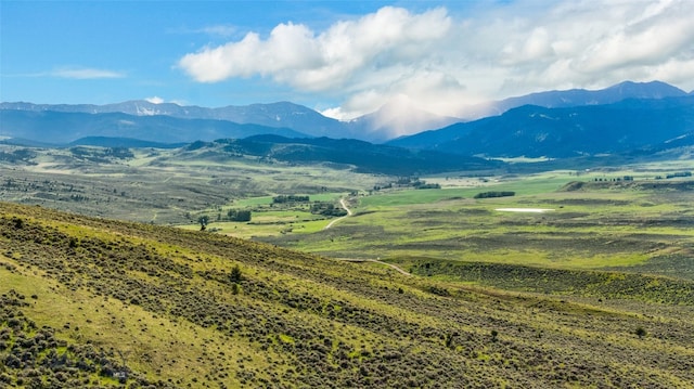 view of mountain feature with a rural view