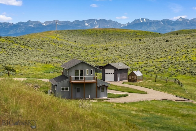 exterior space featuring a mountain view and a rural view