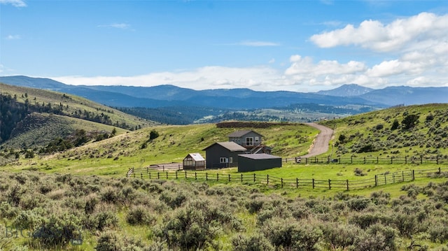 view of mountain feature with a rural view