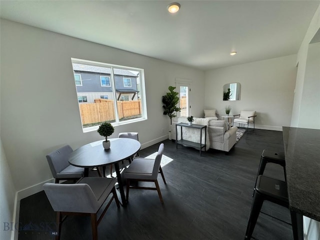 dining room with dark wood-type flooring