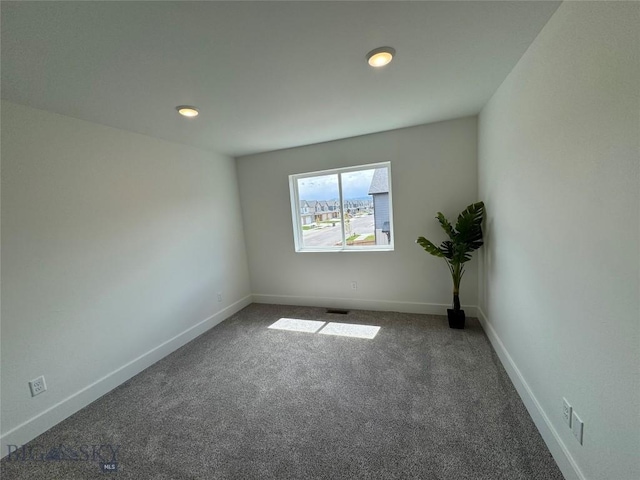 view of carpeted spare room