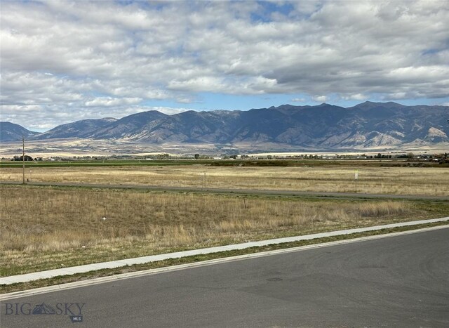 view of mountain feature with a rural view