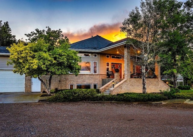 view of front of property featuring a garage