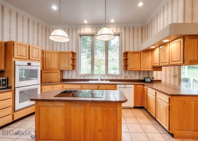 kitchen with white appliances, hanging light fixtures, a center island, and light tile patterned floors