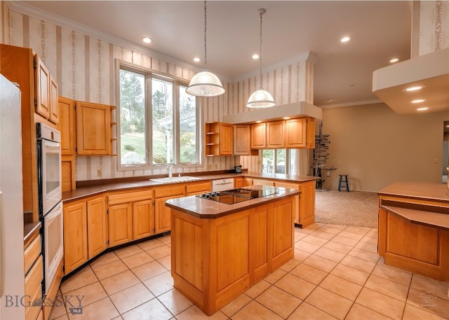 kitchen with crown molding, sink, light tile patterned floors, a center island, and black electric stovetop