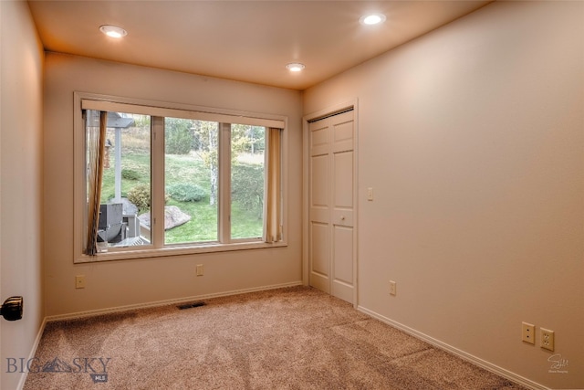 view of carpeted spare room