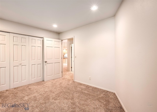 unfurnished bedroom featuring carpet flooring