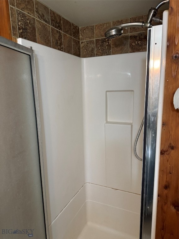 bathroom featuring walk in shower